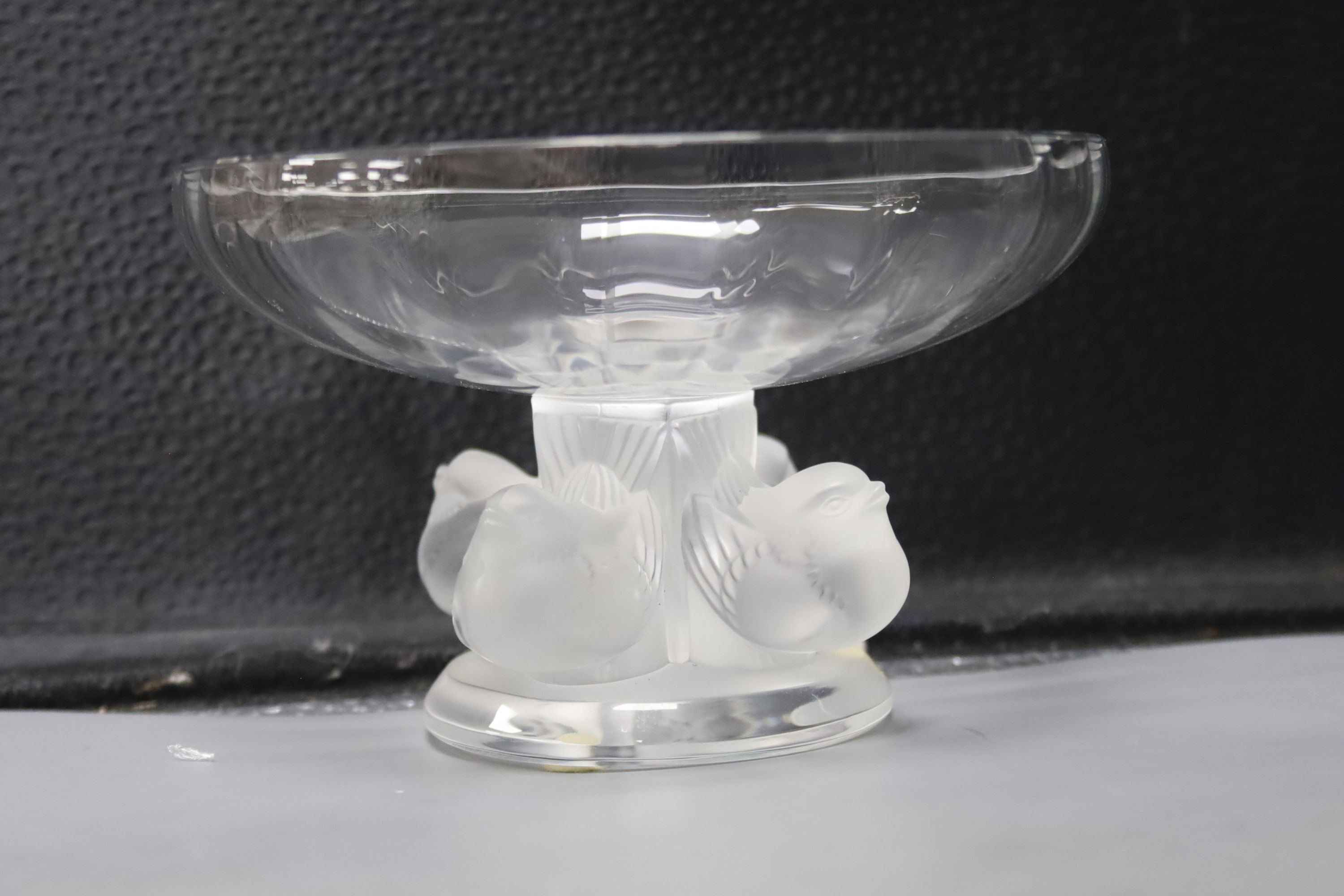 A Lalique 'Nogent' bowl and two frosted glass models of birds, 'Singing Robin' and 'Worried Robin'